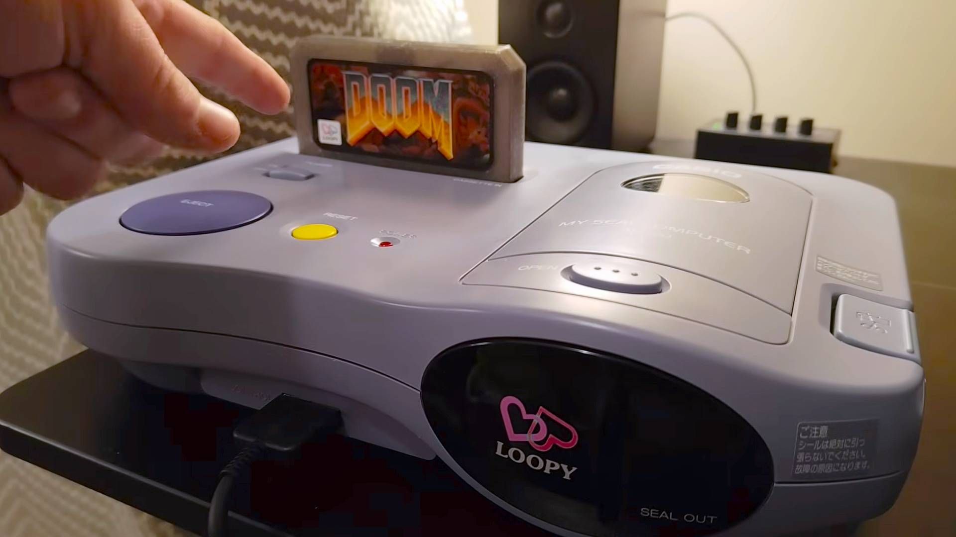 A 1995 sticker-printer console just ran DOOM — and that's the exact kind of chaos gaming needs right now